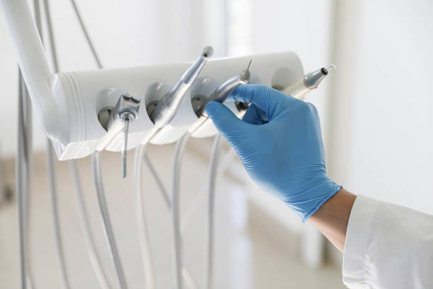 Professional Root Canal Treatment technician working in Naples, FL